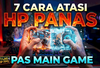 Tangan memegang HP Android panas dengan pendingin cooler saat bermain game